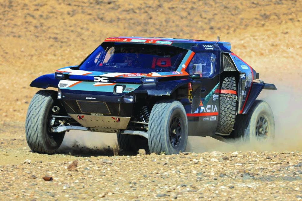 
Qatar’s driver Nasser al-Attiyah and his navigator Edouard Boulanger drive during the prologue of the 47th Dakar Rally, in Bisha, Saudi. 