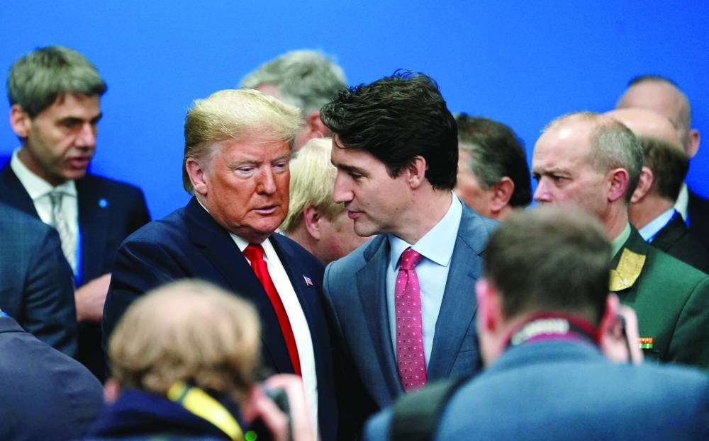 Canadian PM Justin Trudeau having a word with US president Donald Trump during a Nato Plenary Session at the Nato summit in Watford, near London, on December 4, 2019. (Reuters)