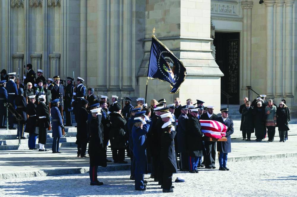 
The remains of former US president Jimmy Carter are carried by an honour guard after a state funeral service at the Washington National Cathedral in Washington. – AFP 