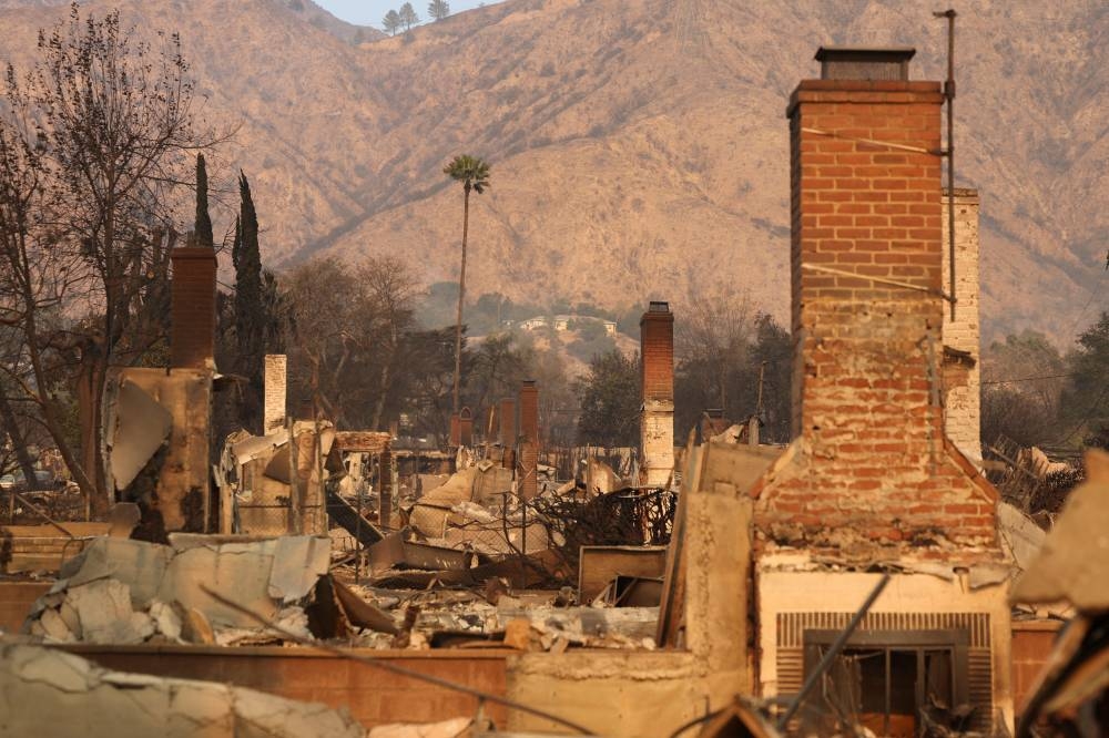 Property destroyed by the Eaton Fire lie in ruin, on Friday. REUTERS