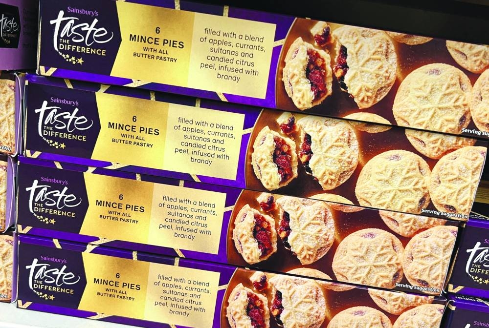 
Boxes of mince pies are seen on the shelf of a Sainsbury’s supermarket in Manchester. 