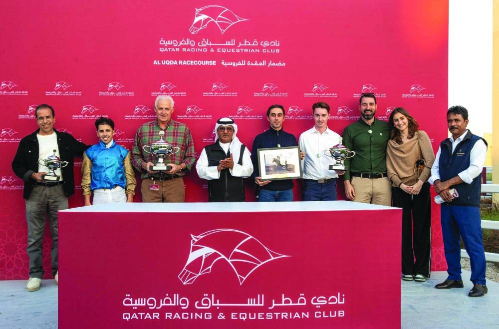 
The connections of Wathnan Racing’s Rothstein celebrate with the trophies. 