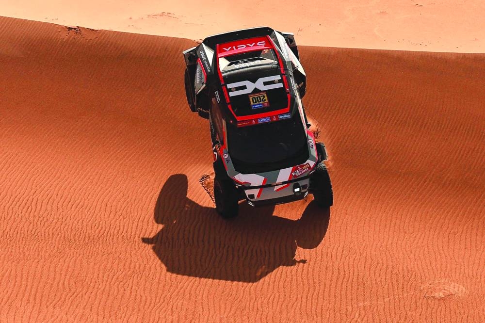
Qatari driver Nasser al-Attiyah and French co-driver Edouard Boulanger compete during stage 8 of the Dakar Rally, between Al Duwadimi and Riyadh in Saudi. (AFP) 