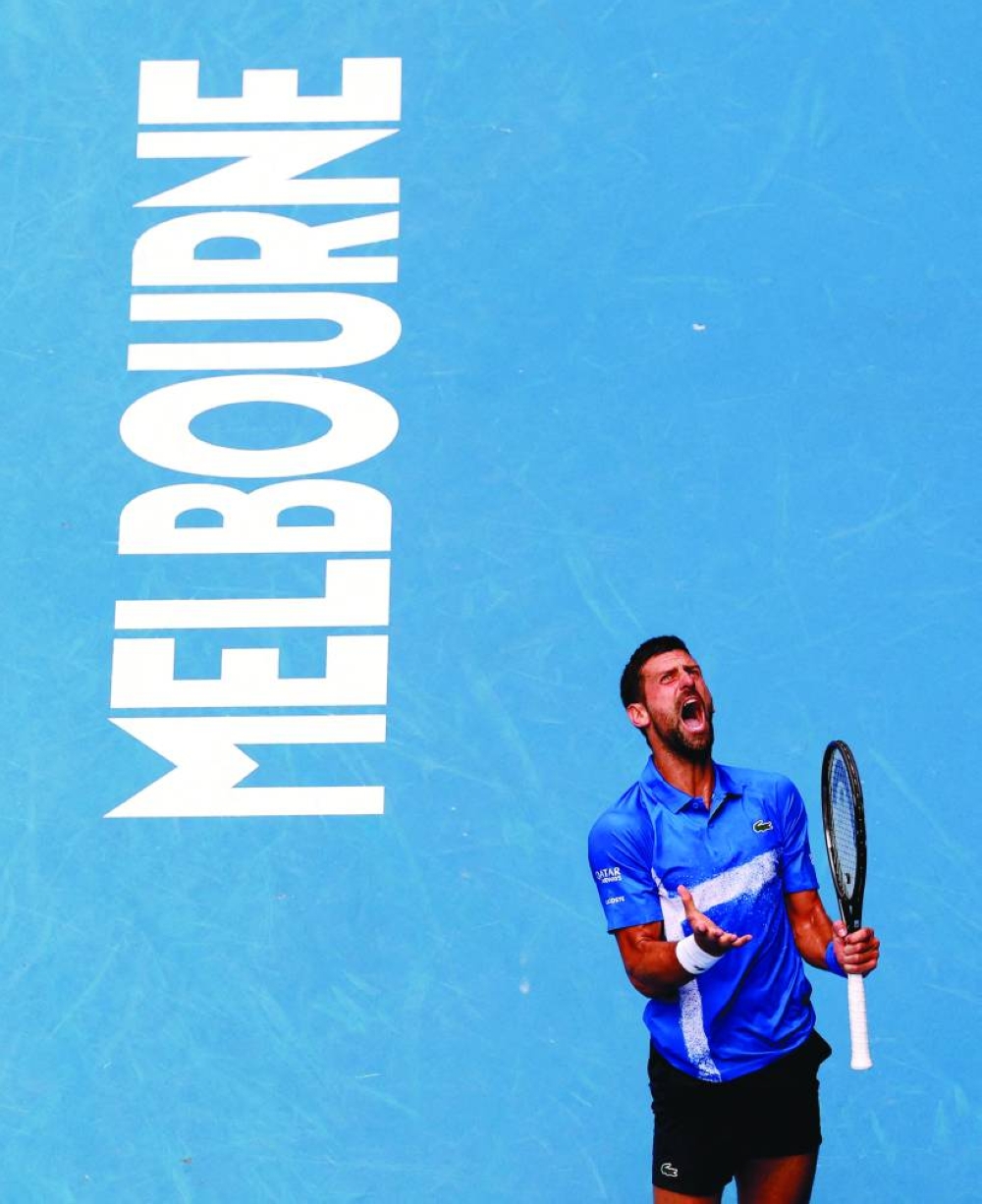 Serbia’s Novak Djokovic reacts during his second round match against Portugal’s Jaime Faria at the Australian Open on Wednesday. (Reuters)