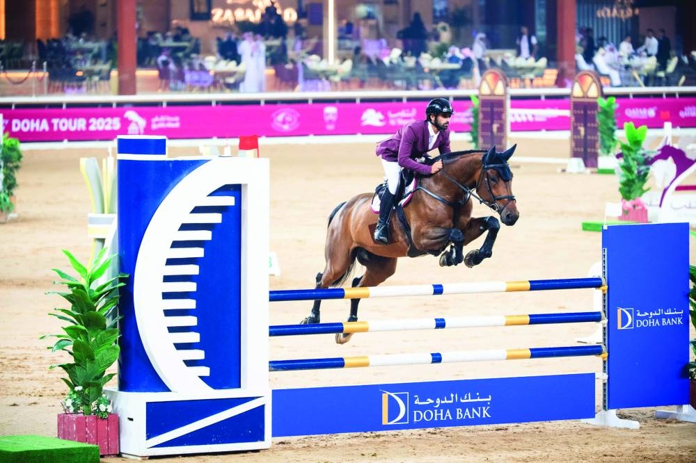 Qatar’s Rashid al-Marri astride Navaronne clears a rail during the second leg of the Doha International Tour at the Longines Arena of Al Shaqab on Thursday.