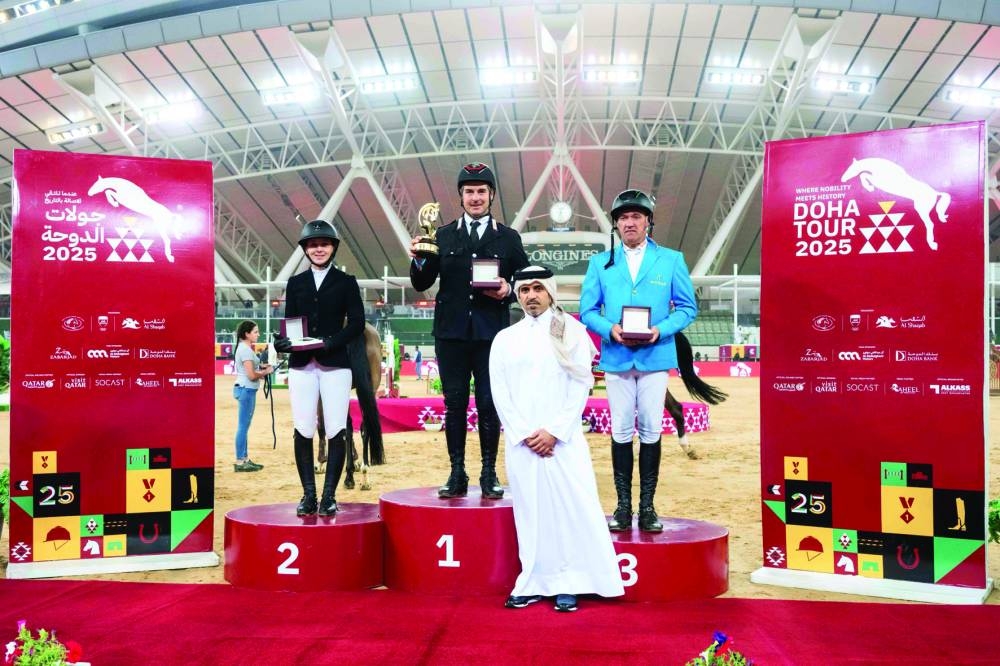 
Bader bin Mohammed al-Darwish, Vice-Chairman of Organising Committee of Doha International Tour, poses with CSI4*- Faults & Time - 1.45m class winner Emanuele Gaudiano, runner-up Millie Allen, third-placed Gerfried Puck. 