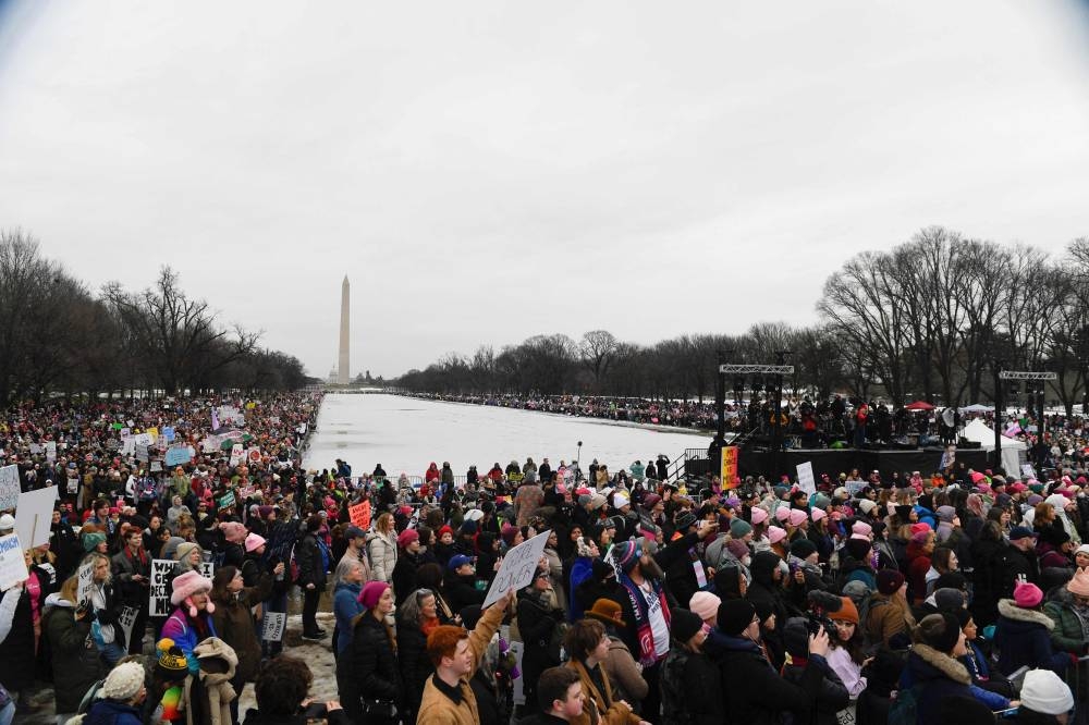 Protestors representing a variety of rights groups attend the "People's March on Washington" Saturday.
