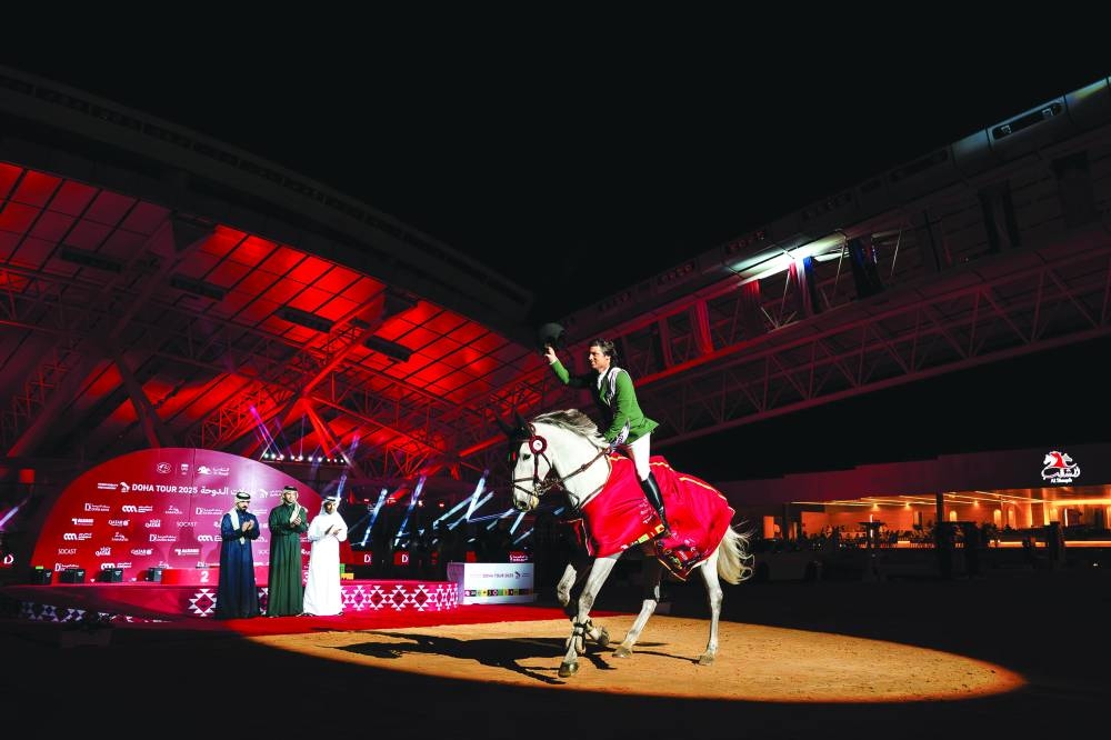 Duarte Seabra of Portugal takes a lap of honour with his gelding Dourados 2 after winning the CSI4* Grand Prix during the the second round of Doha International Equestrian Tour at Al Shaqab on Saturday.