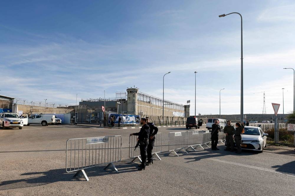 Members of the Israeli security forces stand guard in front of the Ofer military prison located between Ramallah and Beitunia in the occupied West Bank, on Wednesday. AFP