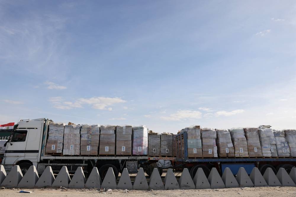 A truck carrying aid waits near the Rafah border crossing between Egypt and the Gaza Strip, amid a ceasefire between Israel and Hamas, in Rafah, Egypt, on Sunday. REUTERS