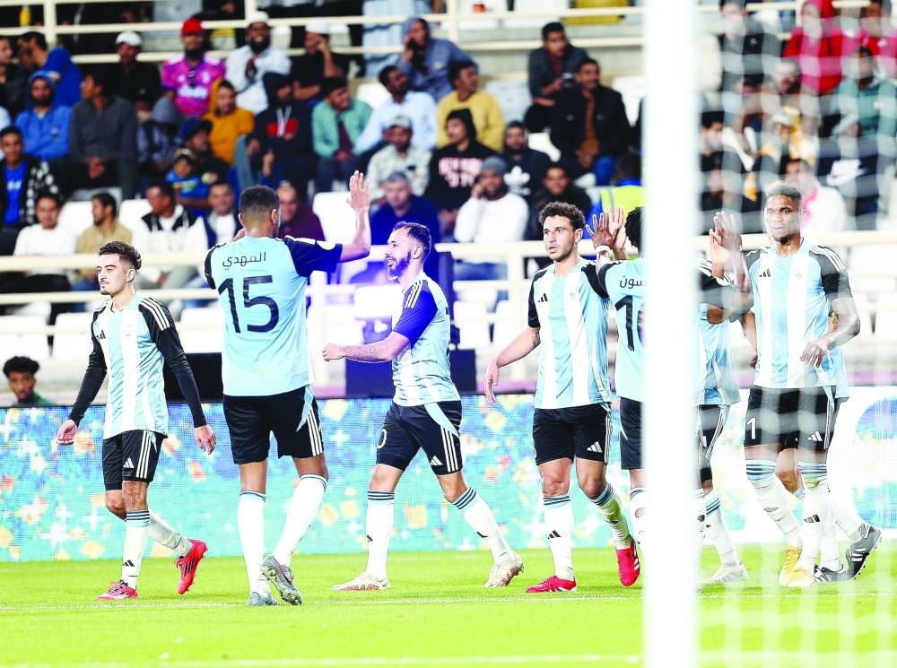 Al Wakrah players celebrate a goal against Al Wahda in Abu Dhabi yesterday.
