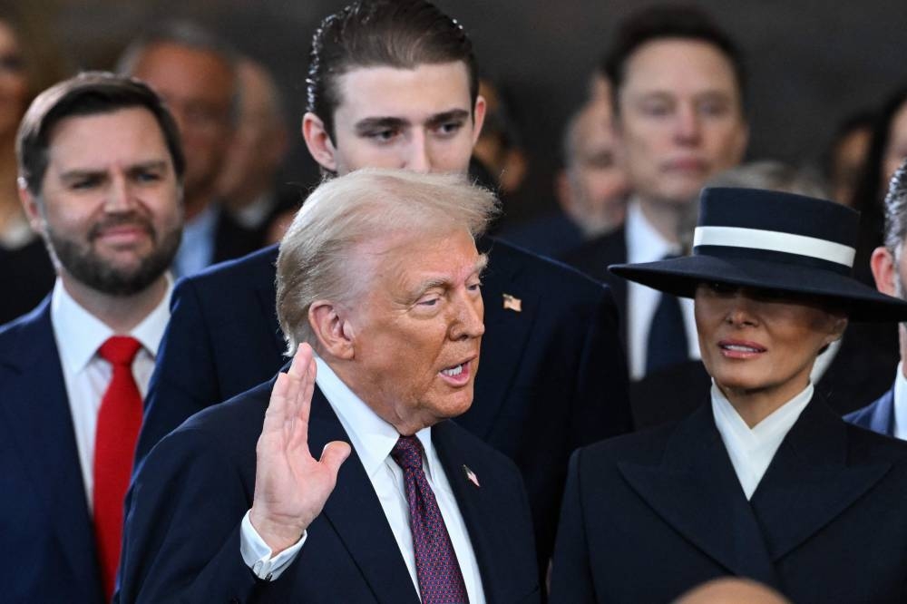 Donald Trump is sworn in as the 47th US President in the US Capitol Rotunda in Washington, DC, on Monday. AFP