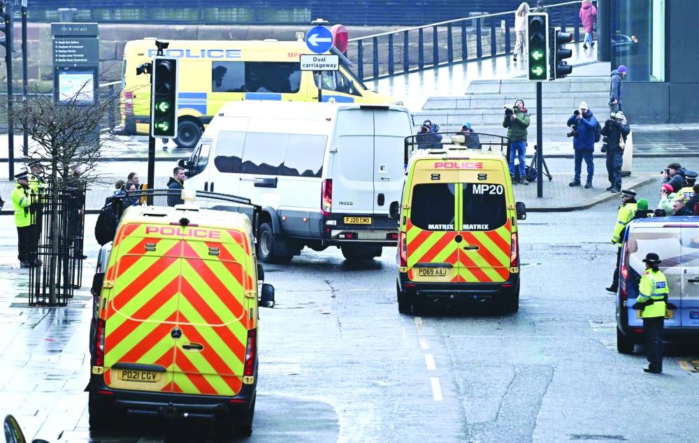 
A prison van leaves The Queen Elizabeth II Law Courts in Liverpool, north west England following the guilty plea of alleged Southport attacker Axel Rudakubana. 