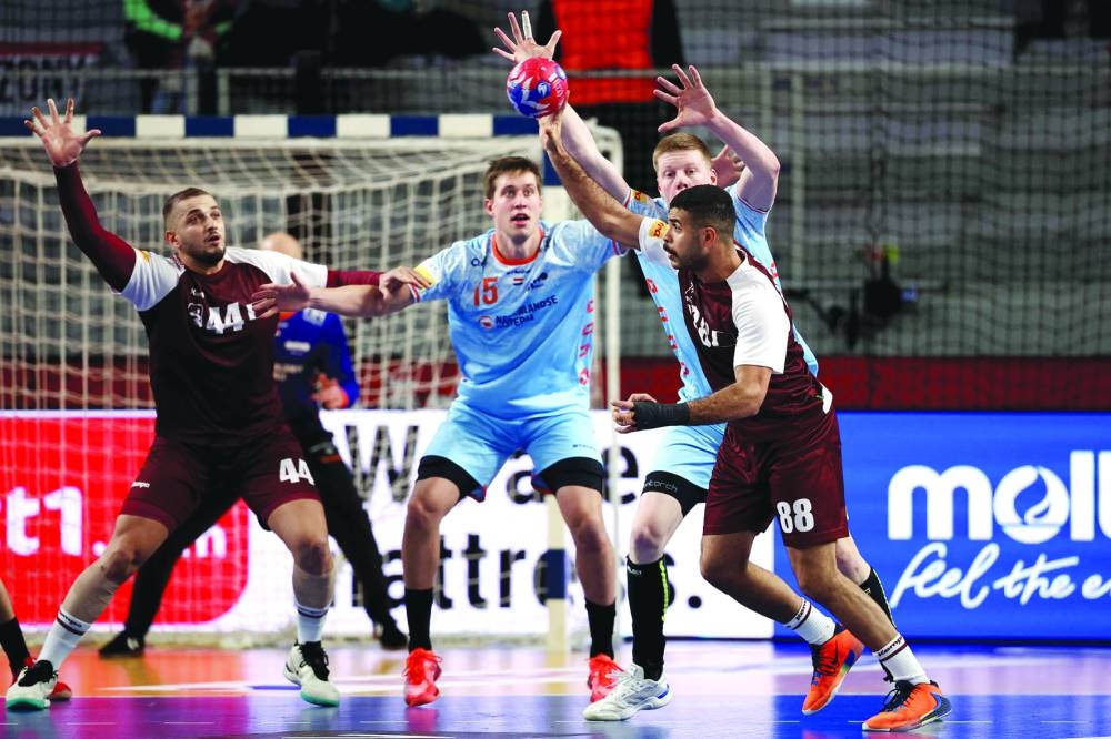 
Qatar’s centre back Moustafa Heiba (right) in action against the Netherlands during the IHF World Handball Championship in Varazdin, Croatia. (AFP) 