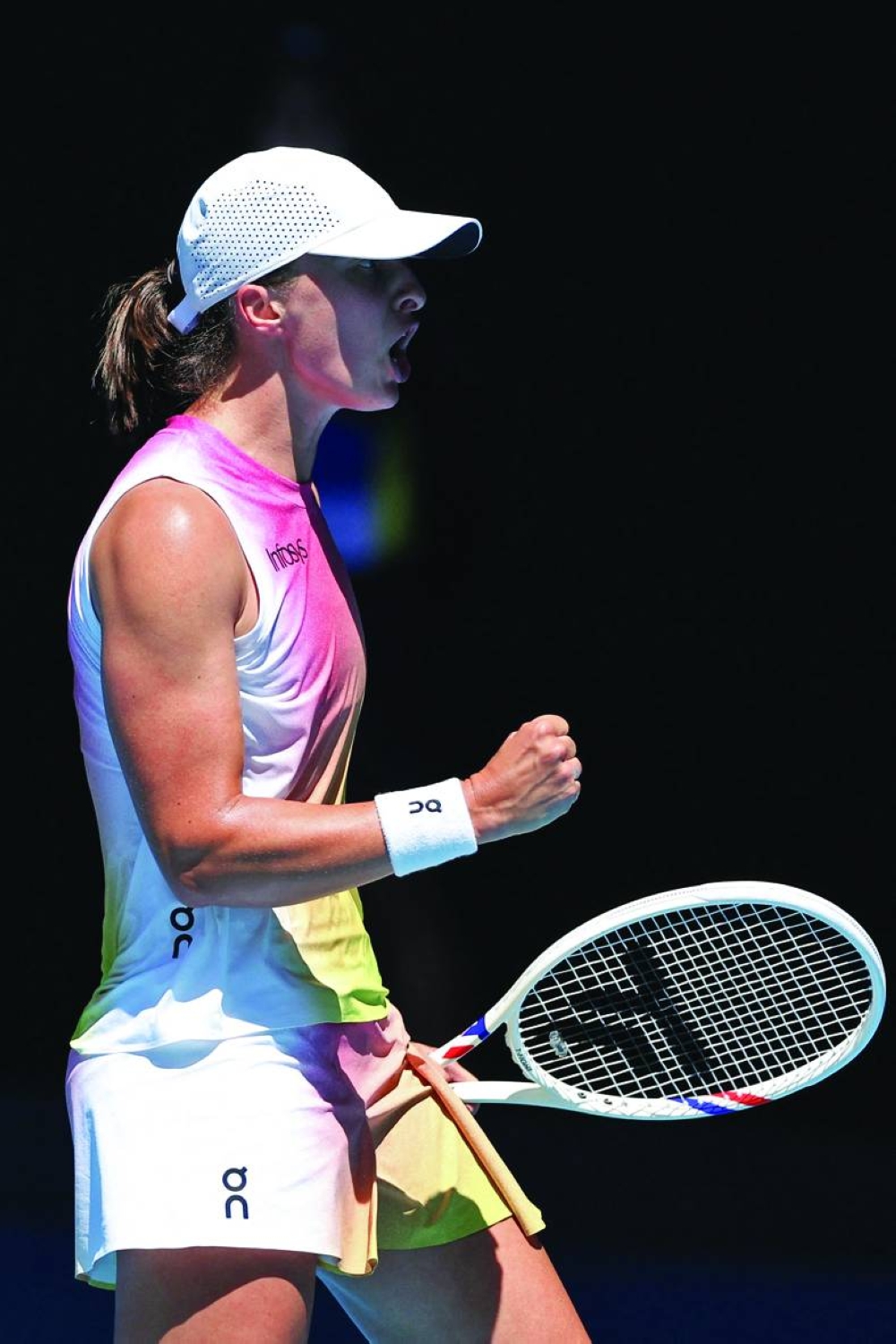 Poland’s Iga Swiatek reacts on a point against USA’s Emma Navarro during their Australian Open quarter-final in Melbourne on Wednesday. (AFP)