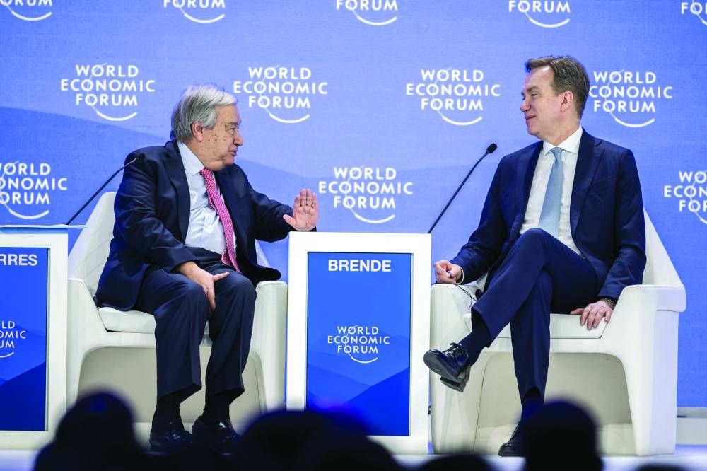 UN Secretary-General Antonio Guterres (L) and World Economic Forum President and CEO Borge Brende attend the WEF annual meeting in Davos on Wednesday 