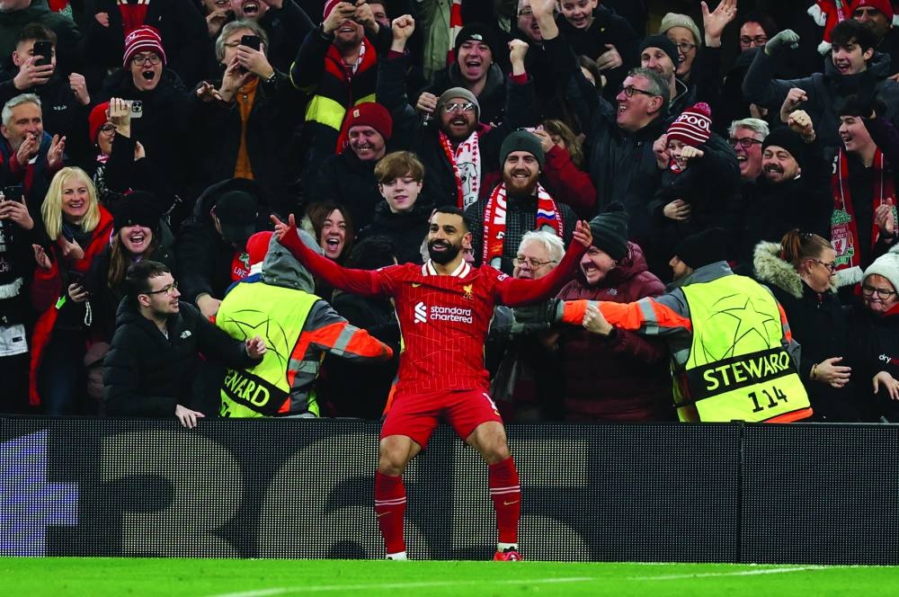 
Liverpool’s Mohamed Salah celebrates after scoring against Lille. (Reuters) 