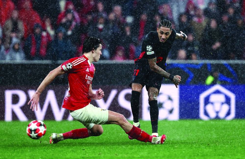 
Raphinha struck a dramatic winner in stoppage time as Barcelona came from behind to beat Benfica 5-4 in a wild match to ensure direct qualification to the Champions League last 16. (Reuters) 