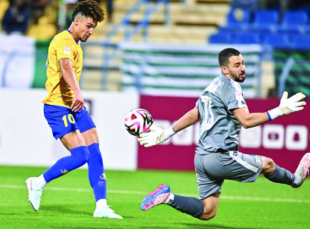 Al Gharafa’s Rodrigo Moreno scores against Al Ahli at the Thani Bin Jassim Stadium on Wednesday. PICTURE: Noushad Thekkayil