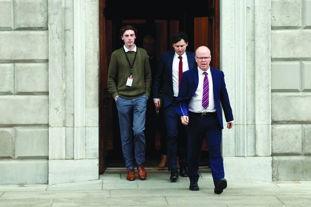 
Leader of Aontu Peadar Toibin walks out of parliament after it is suspended. 