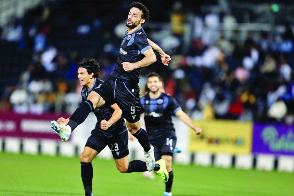 
Qatar SC midfielder Ahmed Abdel Kader celebrates after an own goal from Al Sadd’s Romain Saiss during the Qatar Stars League match at Jassim Bin Hamad Stadium. 