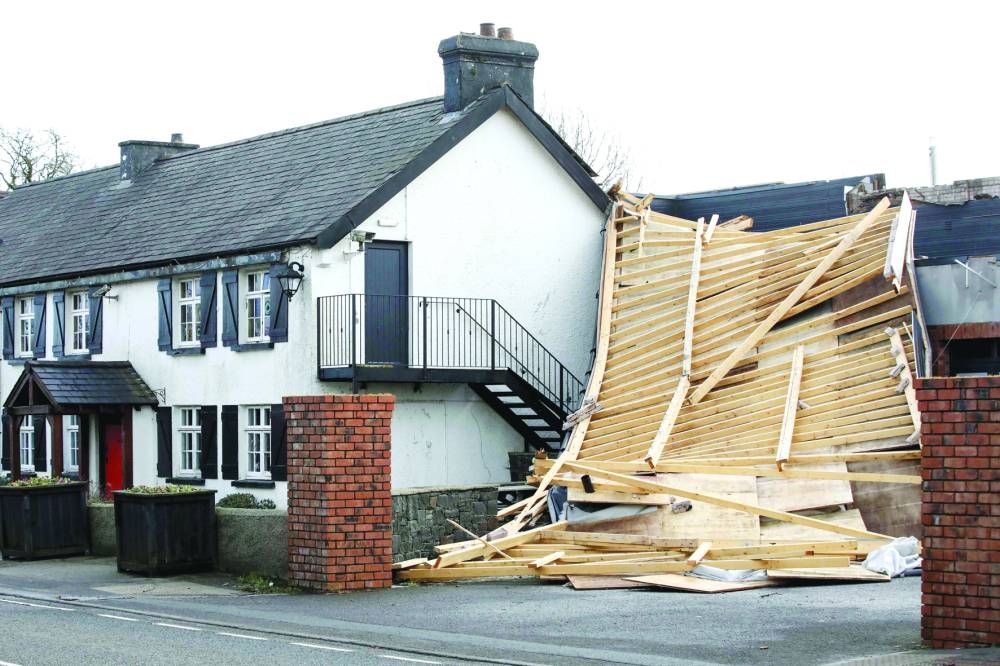 Roof torn off from the Chimney Corner Hotel, outside Belfast, in Co Antrim, in Northern Ireland.