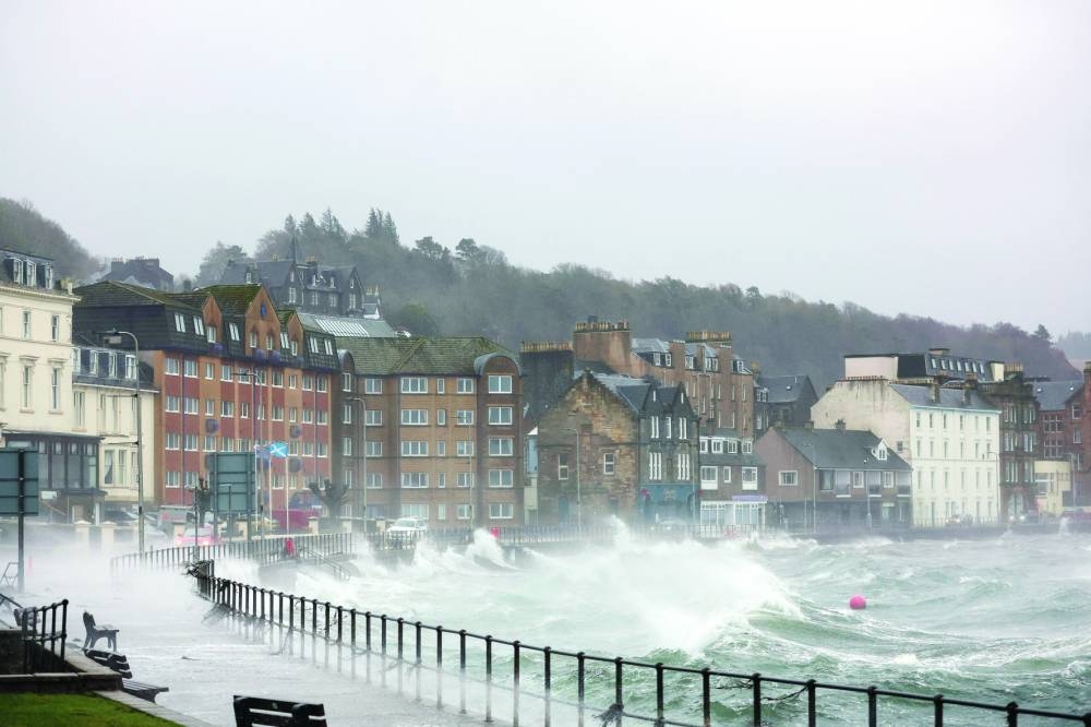 Waves crash over the seafront, as Storm Eowyn hits, in Oban, Scotland.