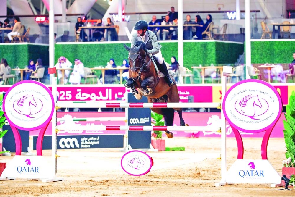 
Germany’s Philipp Weishaupt astride Karaldo clears a rail during the CSI5* - Jump Off - 1.50m class at the Doha International Equestrian Tour at Al Shaqab. 