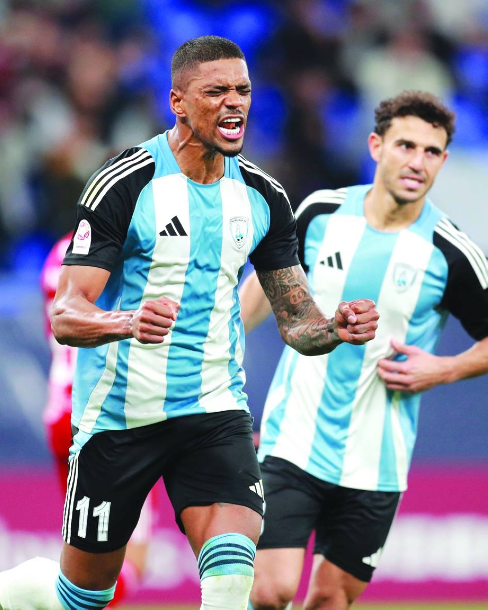 Al Wakrah’s Ricardo Gomes (left) celebrates after scoring against Al Arabi 4-3 at the Stadium 974 on Friday.