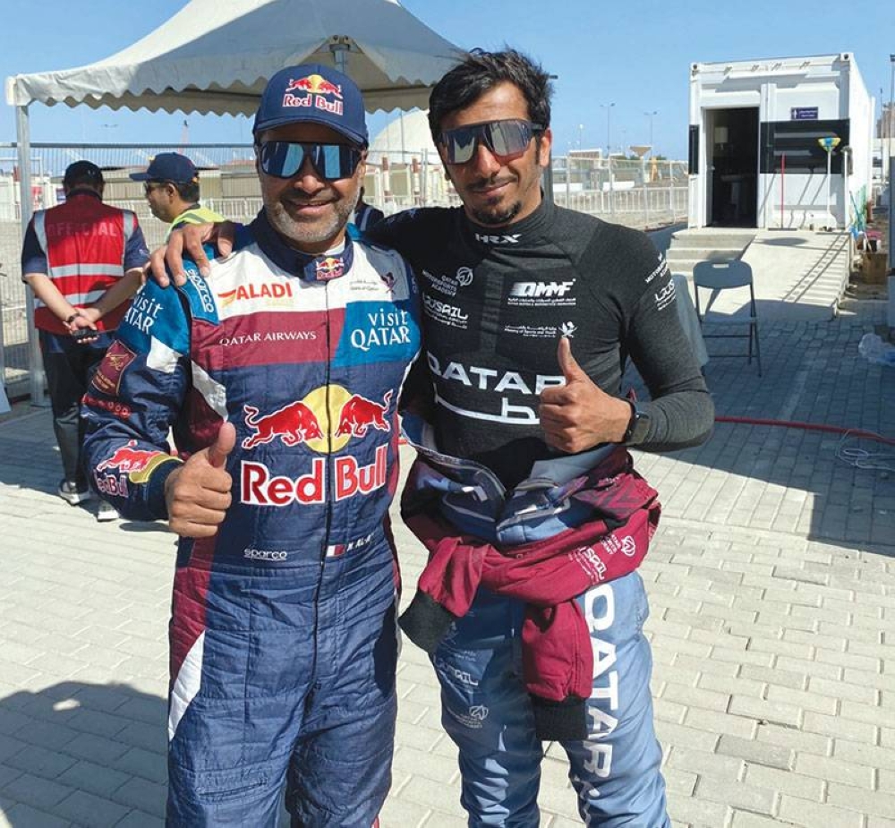 Qatar’s Nasser Saleh al-Attiyah with compatriot Abdulaziz al-Kuwari at the Oman Rally.