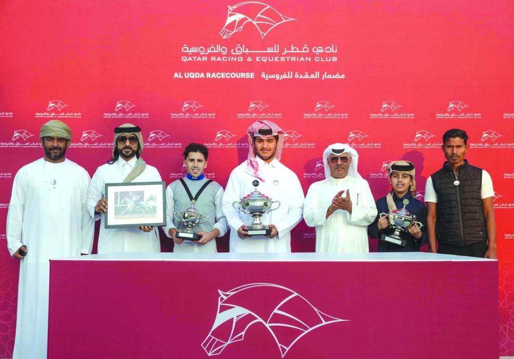 Connections of Sun Amer celebrate after the six-year-old won the Ras Umm Hasah Cup on Saturday. PICTURES: Juhaim
