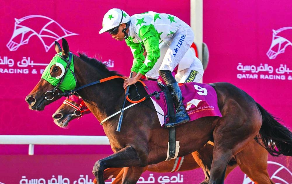 Arnaud De Lepine pilots Al Warkah to Ras Rokn Island Cup victory at the Al Uqda Racecourse on Thursday. PICTURES: Juhaim