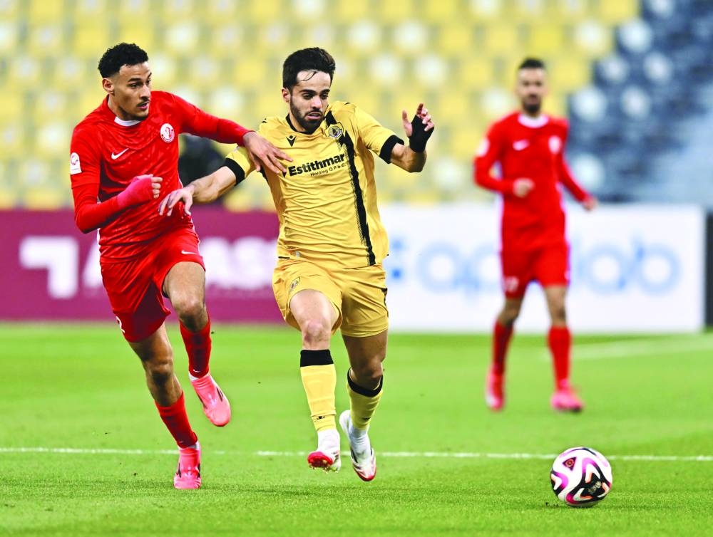 
Action from the Qatar Stars League match between Qatar SC and Al Shamal. 