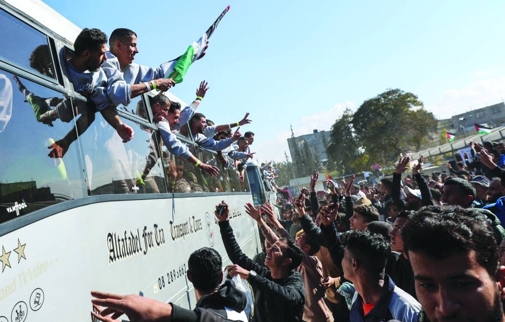 Freed Palestinian prisoners are greeted in Khan Younis in the southern Gaza Strip, Saturday.