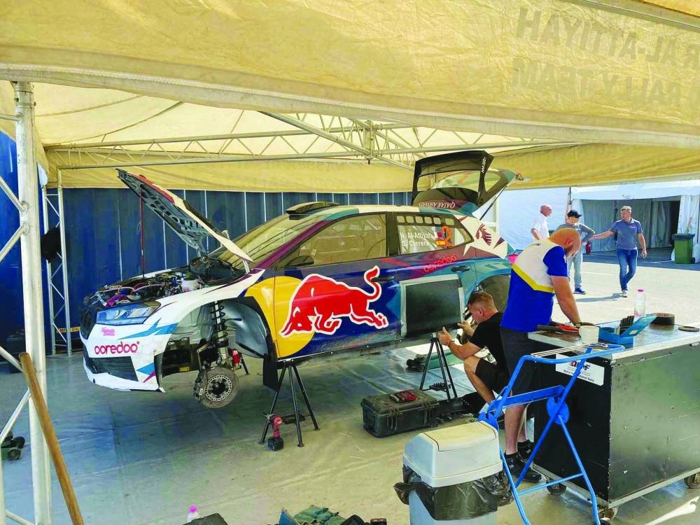Nasser Saleh al-Attiyah’s car undergoes final preparations on Tuesday at the Lusail International Circuit, ahead of Qatar International Rally.