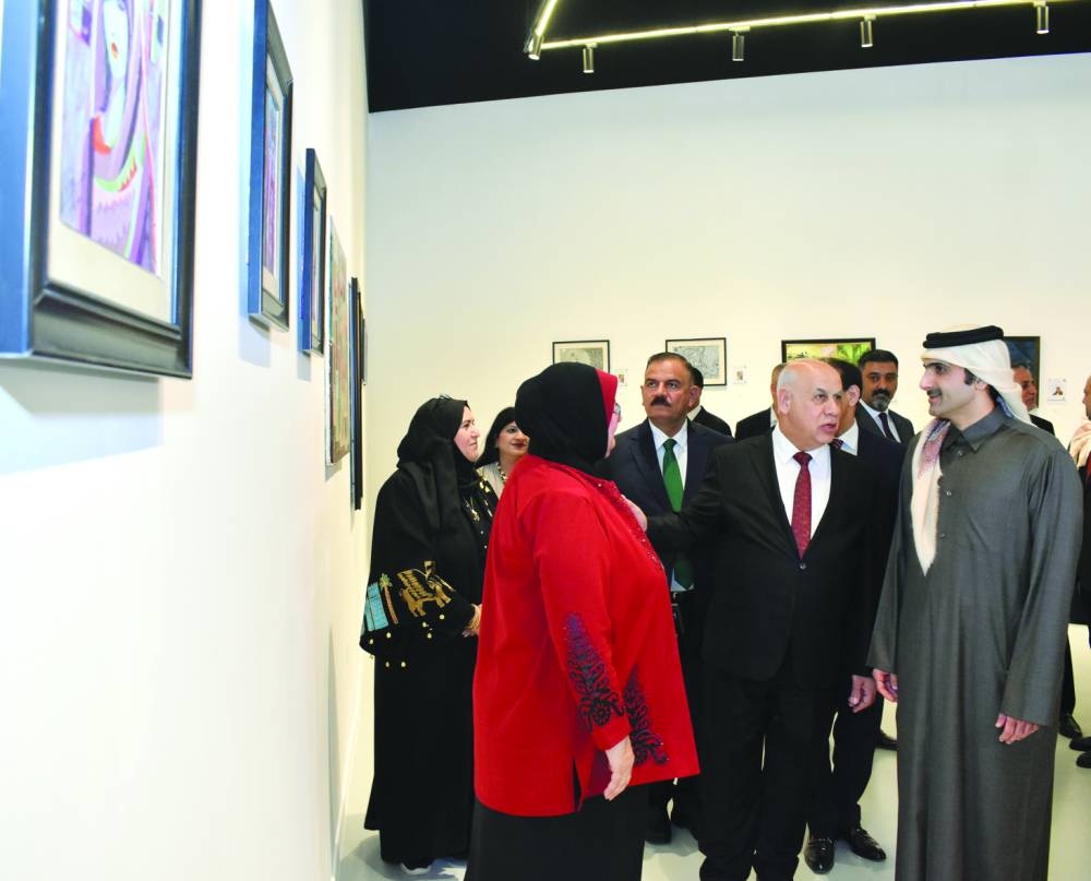 HE Sheikh Abdulrahman bin Hamad al-Thani, and HE Dr Ahmed Fakak al-Badrani, visiting an art gallery exhibition. PICTURE: Thajudheen