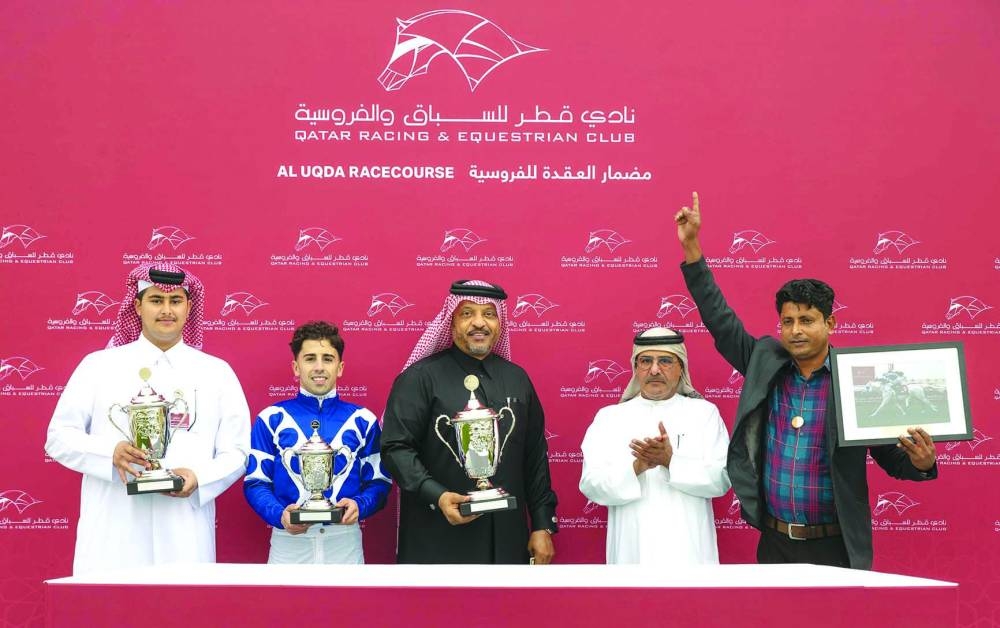 Connections of Ginkeau celebrate after the nine-year-old won the Al Arish Cup at the Al Uqda Racecourse on Thursday.   Soufiane Saadi guides Ginkeau to a thrilling win at the Al Uqda Racecourse on Thursday. PICTURES: Juhaim