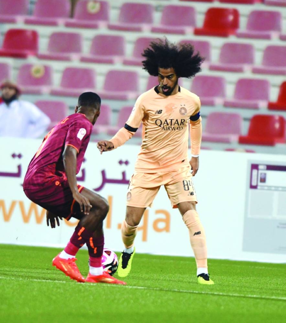 Al Sadd’s Akram Afif in action against the Umm Salal on Friday.
