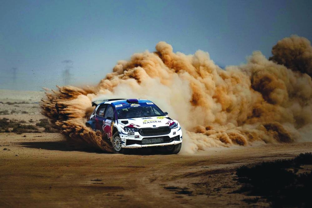Qatar’s Nasser Saleh al-Attiyah and his Spanish co-driver Candido Carrera in action through the northeastern desert at the Qatar International Rally on Friday.