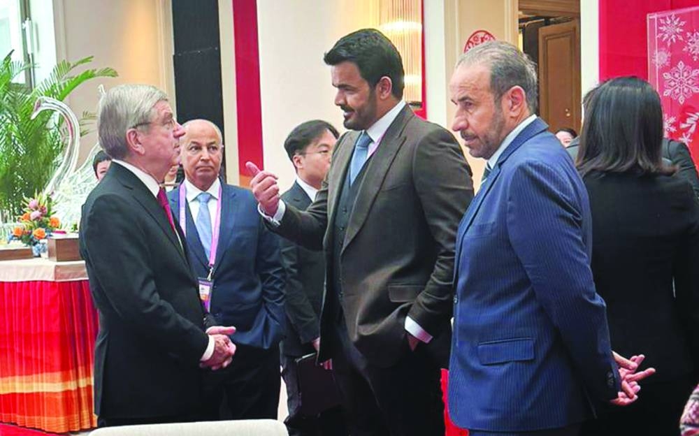 
HE Sheikh Joaan bin Hamad al-Thani, President of the Qatar Olympic Committee, talks to International Olympic Committee President Thomas Bach at the lunch banquet hosted by China’s President Xi Jinping at the opening ceremony of the 9th Asian Winter Games in Harbin. 