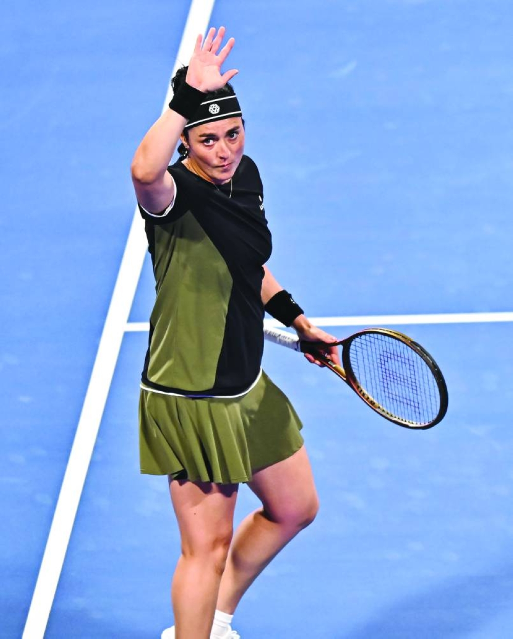 
Ons Jabeur of Tunisia gestures during her match against McCartney Kessler of the USA yesterday. Jabeur won 6-2, 6-0. 