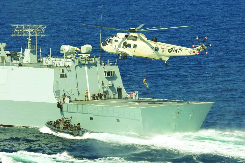
Pakistan Navy’s special force conducts a joint counter-piracy demo during the sea phase of Pakistan Navy’s 9th Multinational Maritime Exercise AMAN-25. (Reuters) 