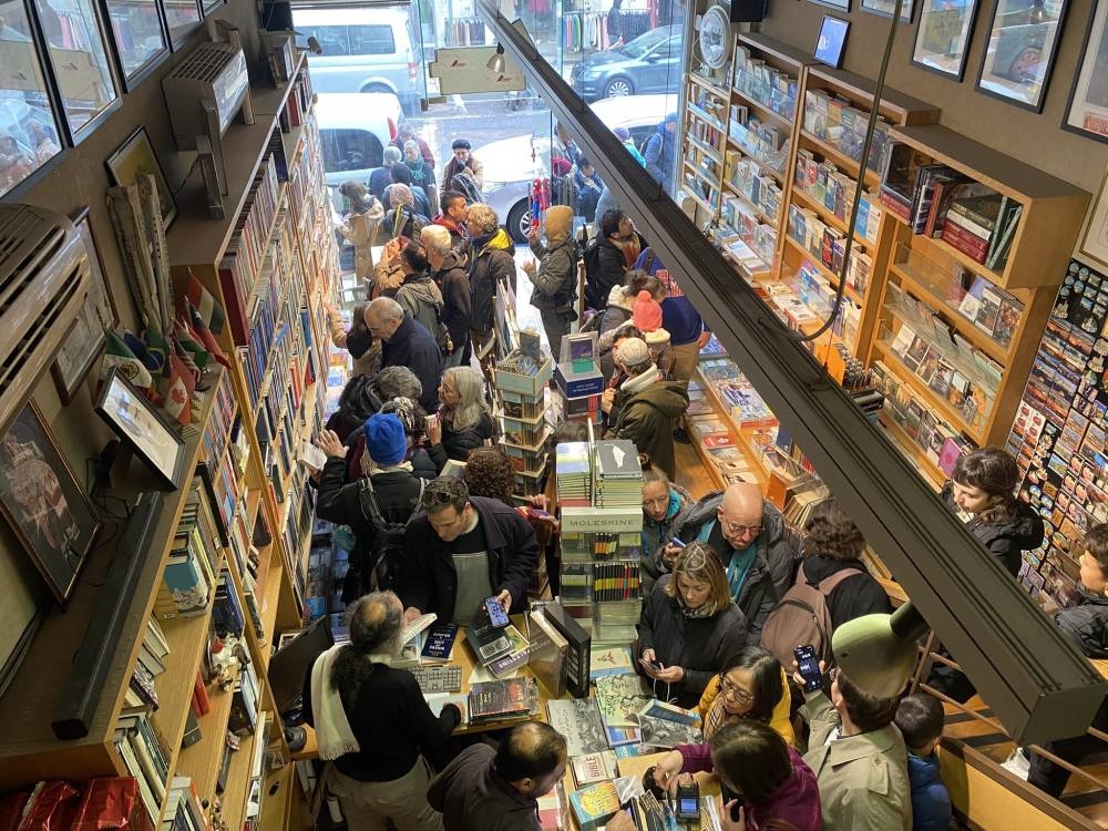 This photo being widely shared on social media shows the Educational Bookshop full with shoppers in solidarity a day after the Israel Police raided the Palestinian store, arrested its owners and confiscated books. They dropped the charges of incitement but still detain them for ‘disturbing the public order.’