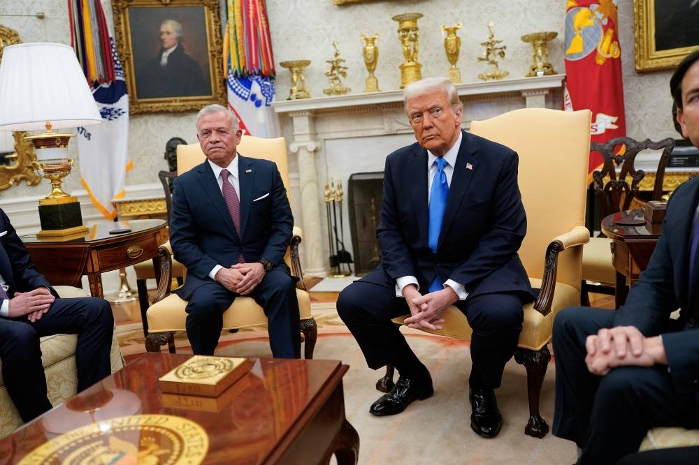 US President Donald Trump meets with Jordan's King Abdullah in the Oval Office at the White House in Washington, on Tuesday. REUTERS
