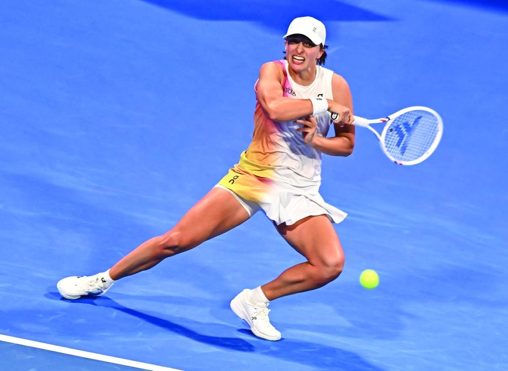 Iga Swiatek of Poland in action against Linda Noskova of the Czech Republic during the Qatar TotalEnergies Open 2025 at the Khalifa International Tennis Complex in Doha on Wednesday. Picture: Noushad Thekkayil
