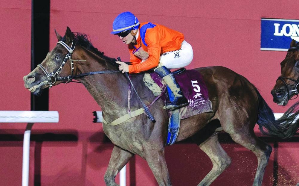 Jockey Maxime Guyon guided Dubawi Spectre to the Thoroughbred Sand Championship win on Thursday.