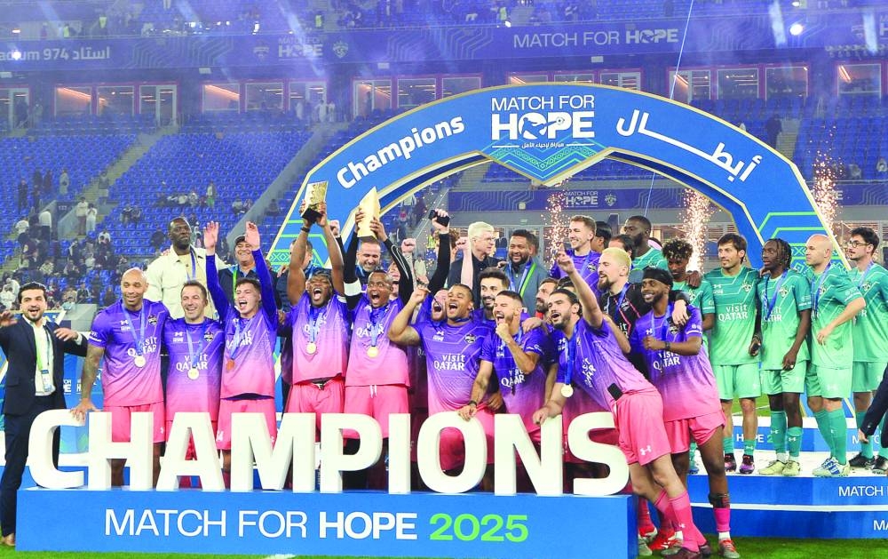 Team KSI x AboFlah celebrate after winning the annual football fundraiser Match for Hope. PICTURES: Shaji Kayamkulam