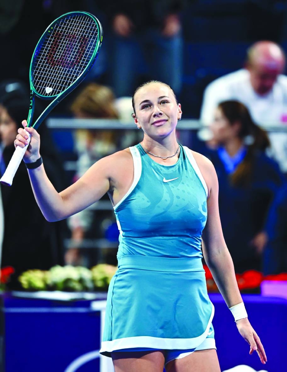 Amanda Anisimova of the US cerebrates beating Ekaterina Alexandrova of Russia on Friday.