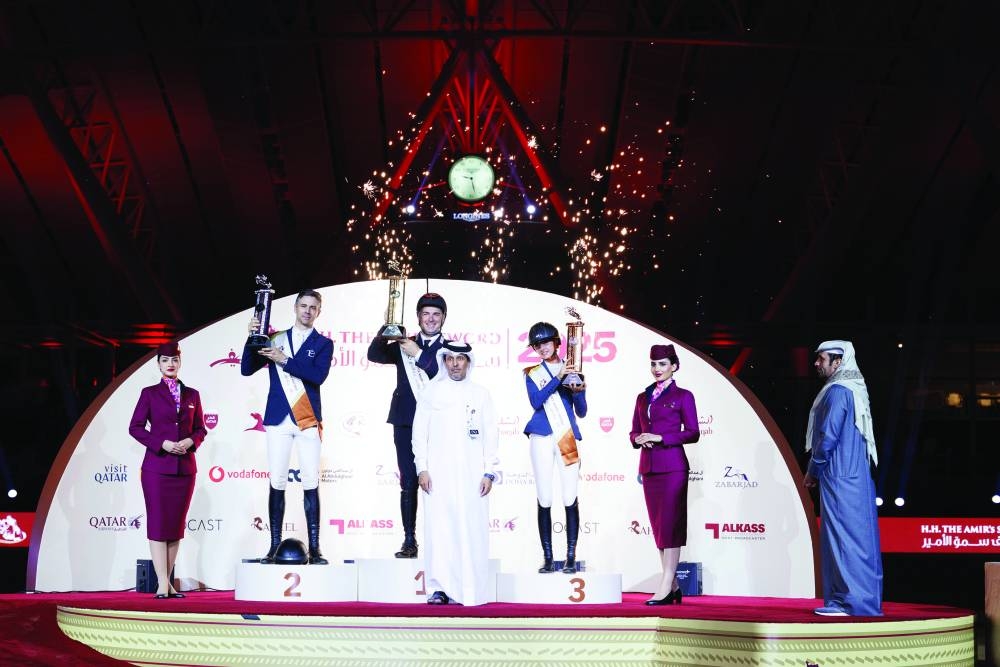 
CSI3*-W - Grand Prix - Jump-Off - 1.50m class winner Emanuele Gaudiano received his trophy from Hamza al-Kuwari, Corporate Services Director at Al Shaqab. Oliver Lazarus finished second, while Jennifer Hochstaedter came third. 