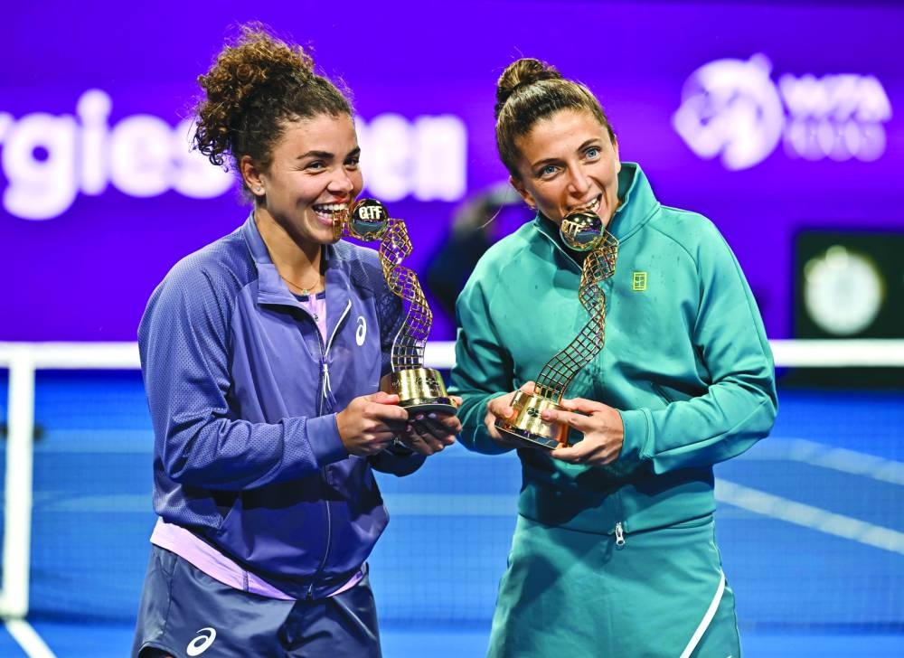 Sara Errani (right) and Jasmine Paolini of Italy pose with their trophies after winning the doubles final against Xinyu Jiang of China and Fang-Hsien Wu of Chinese Taipei. PICTURE: Noushad Thekkayil